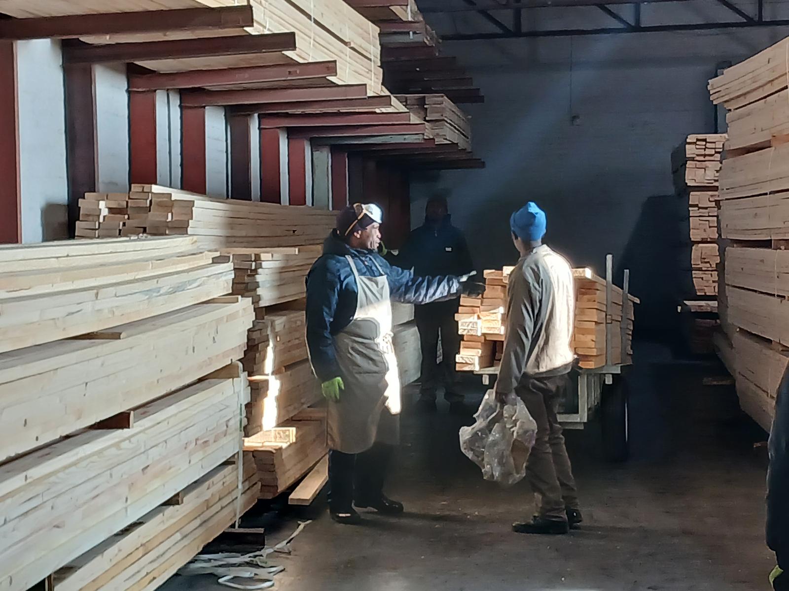 Structural pine timber stacked at a Truss Master plant