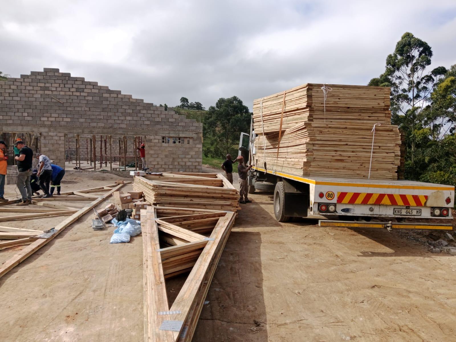 Roof trusses delivered and laid out on a building site