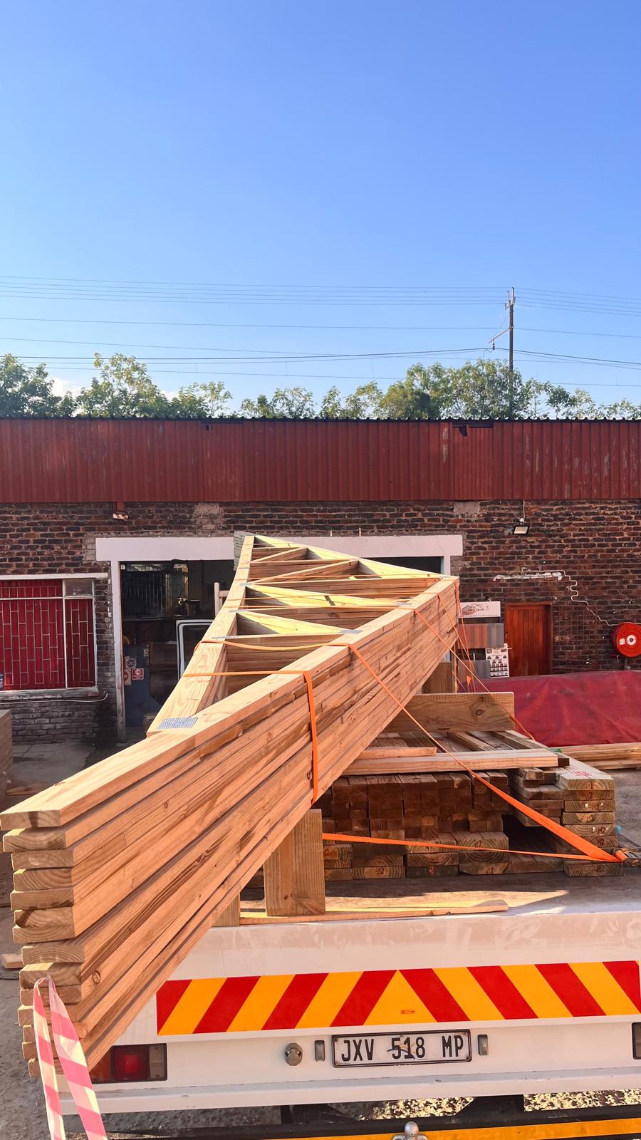 Roof trusses loaded on a Truss Master truck for delivery